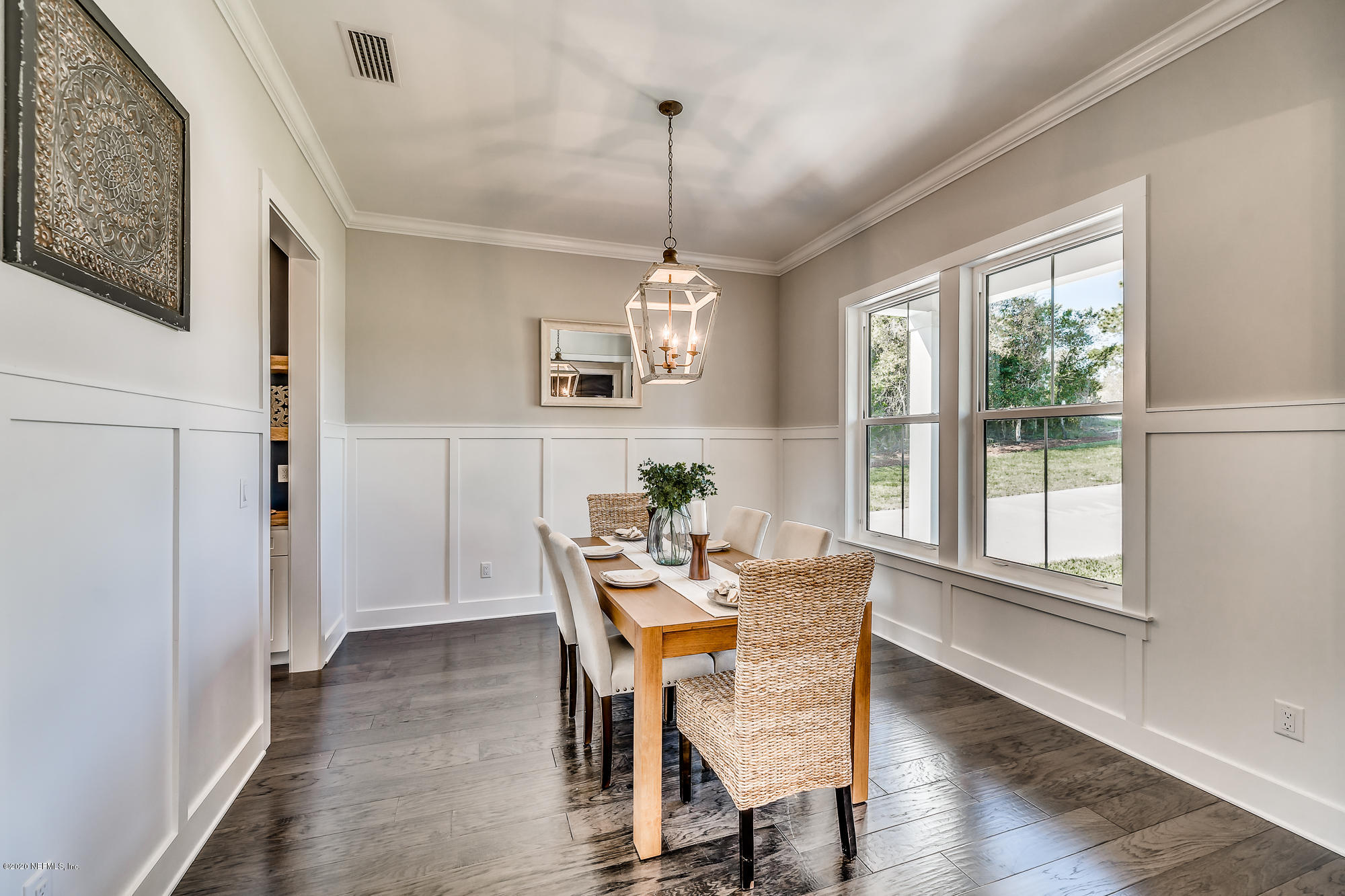 12507 Hidden Drive Jacksonville, FL 32225 - Photo 27 of 66 a dining room with furniture window wooden floor