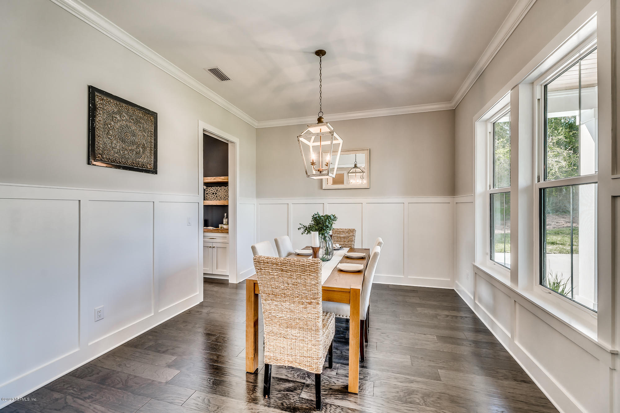 12507 Hidden Drive Jacksonville, FL 32225 - Photo 28 of 66 a view of a dining room with furniture window and wooden floor