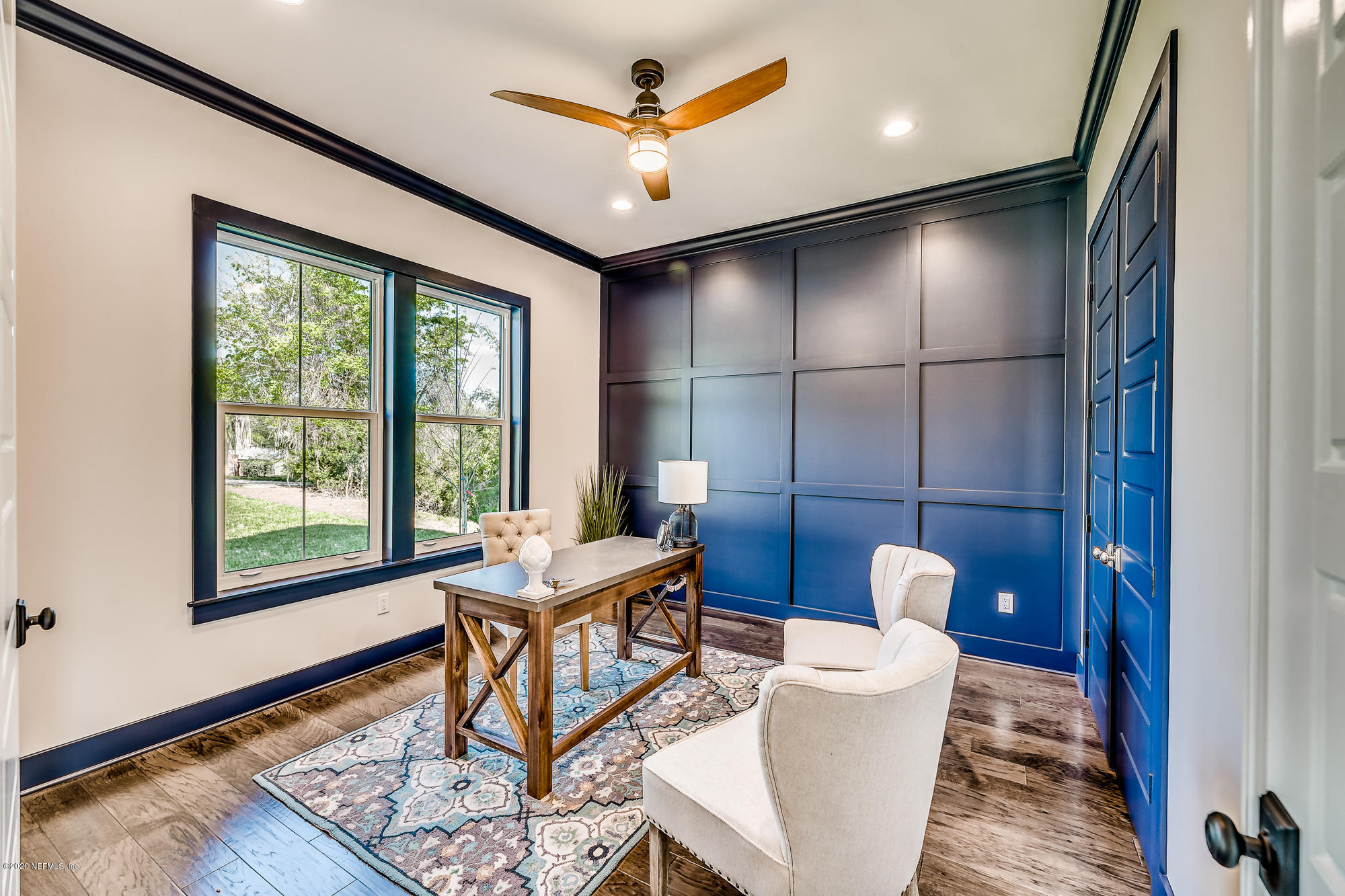 12507 Hidden Drive Jacksonville, FL 32225 - Photo 30 of 66 a living room with a couch and a table