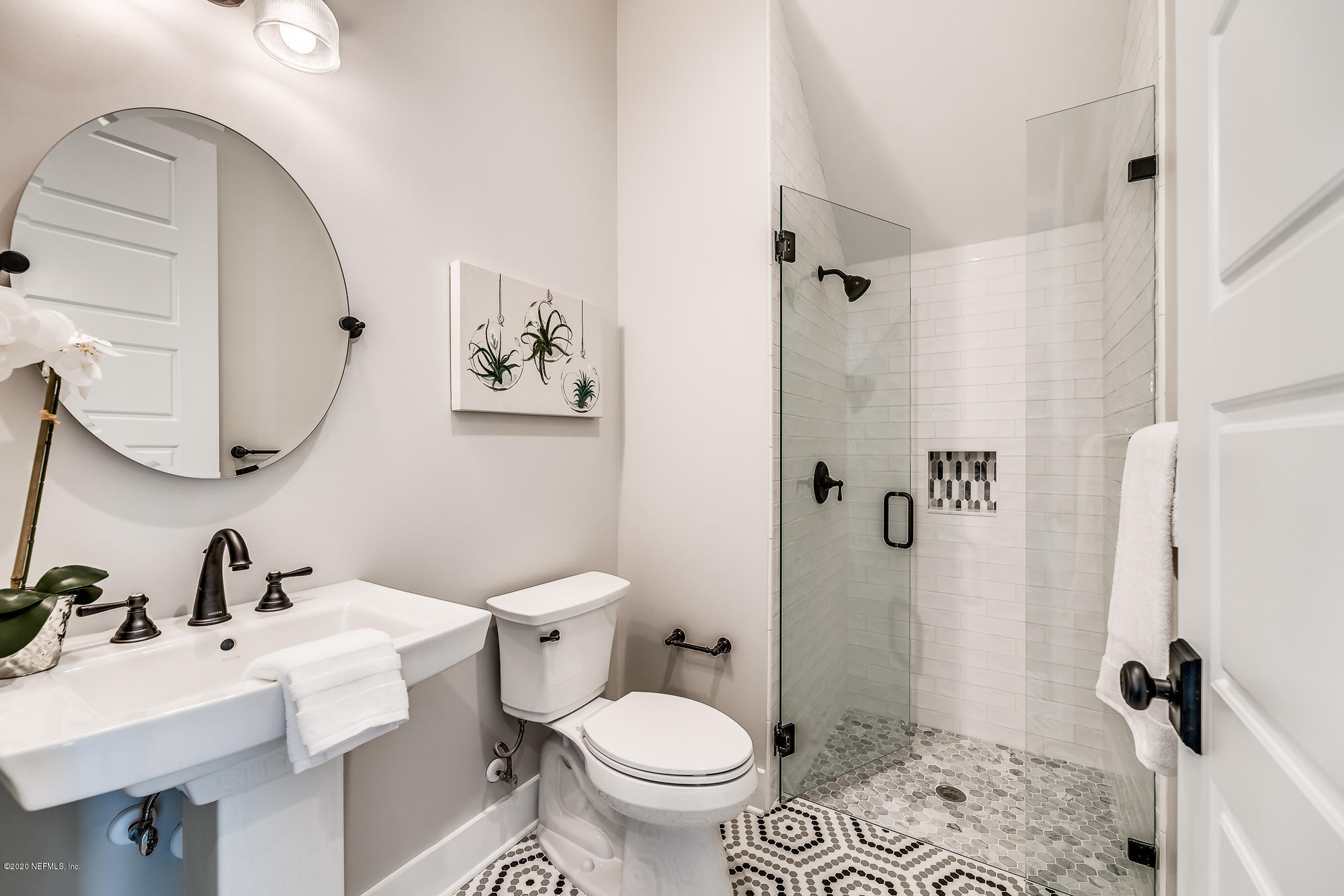 12507 Hidden Drive Jacksonville, FL 32225 - Photo 33 of 66 a bathroom with a sink toilet and shower