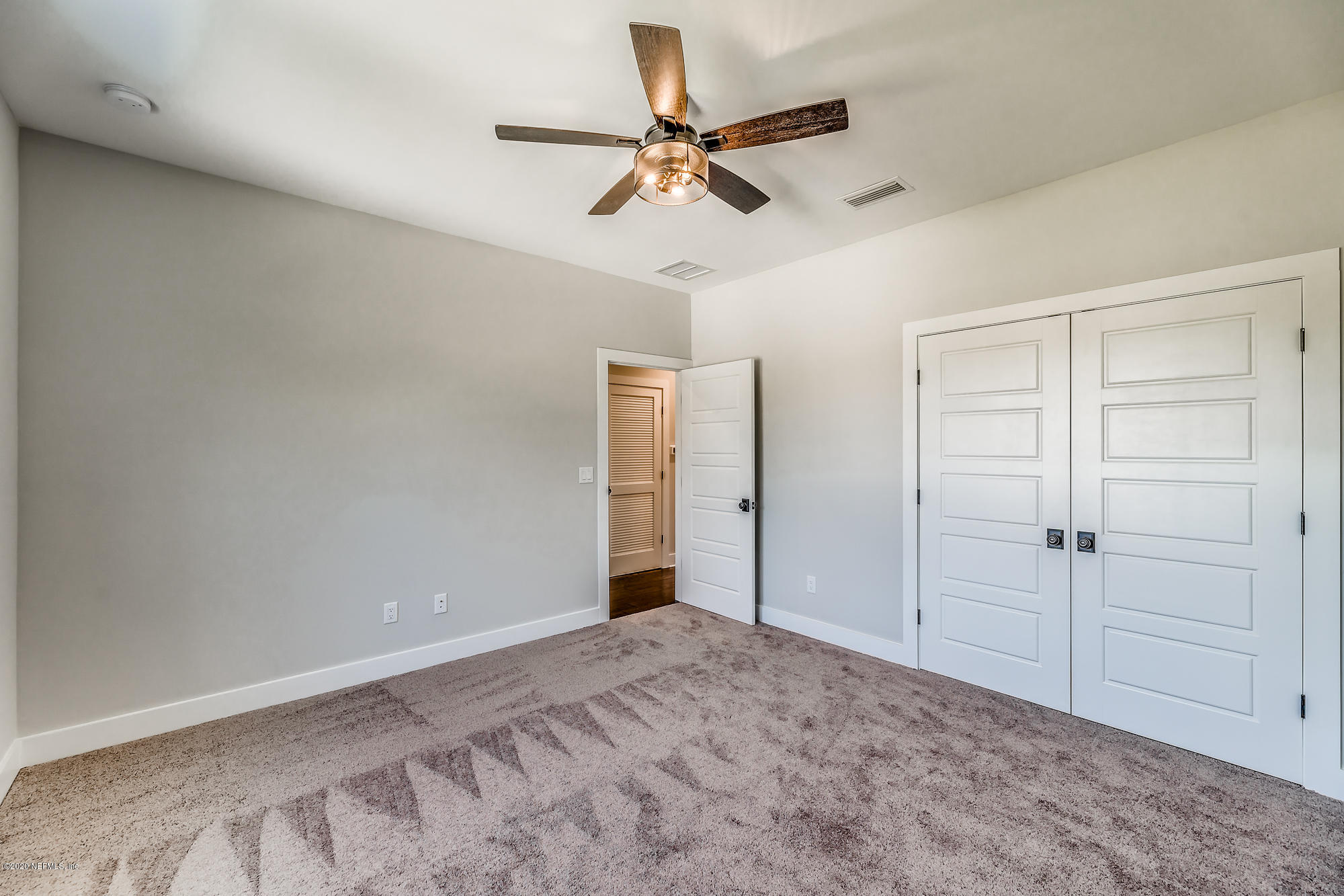 12507 Hidden Drive Jacksonville, FL 32225 - Photo 37 of 66 a view of a livingroom with a ceiling fan