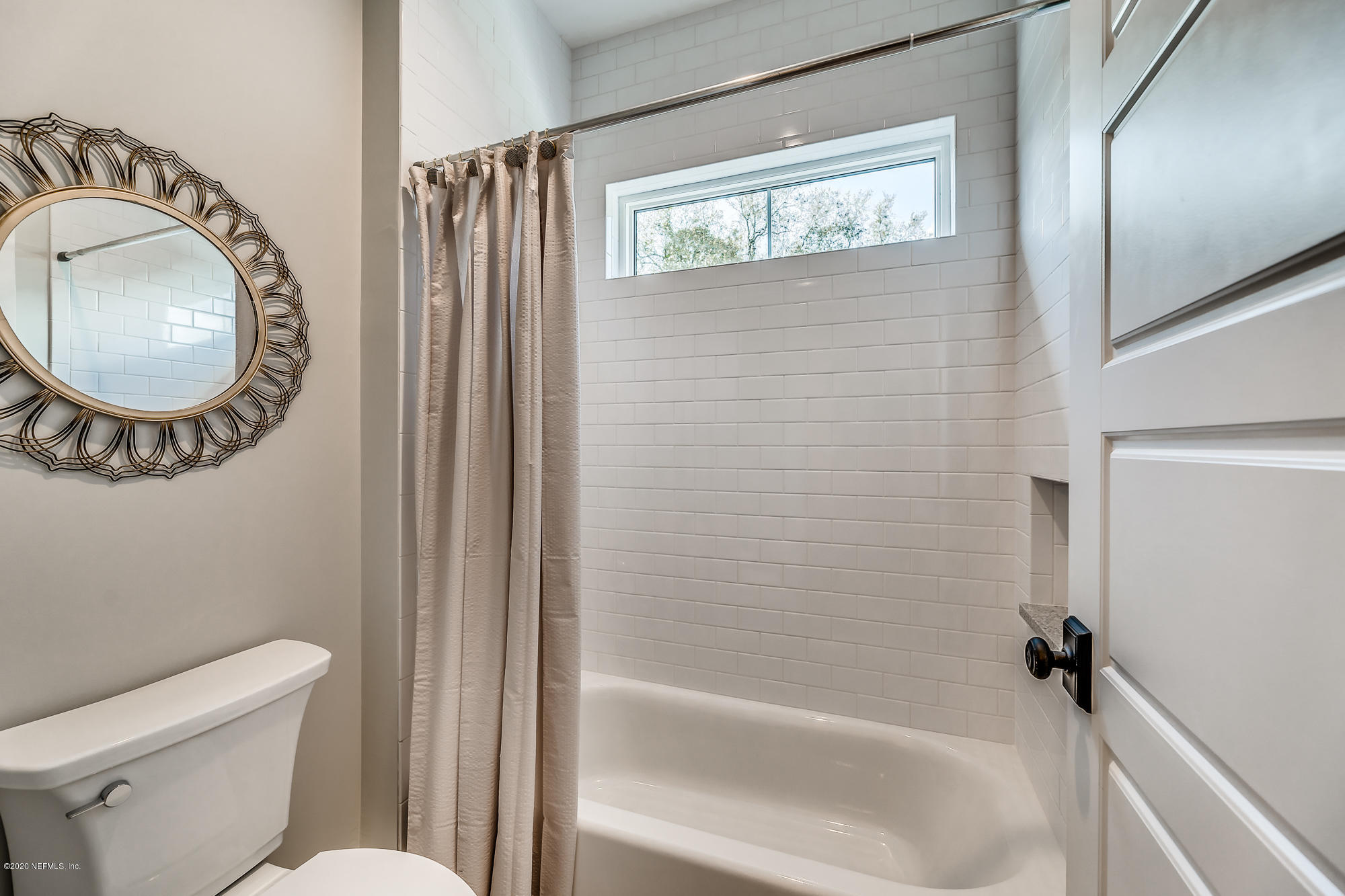 12507 Hidden Drive Jacksonville, FL 32225 - Photo 40 of 66 a bathroom with a toilet and a shower