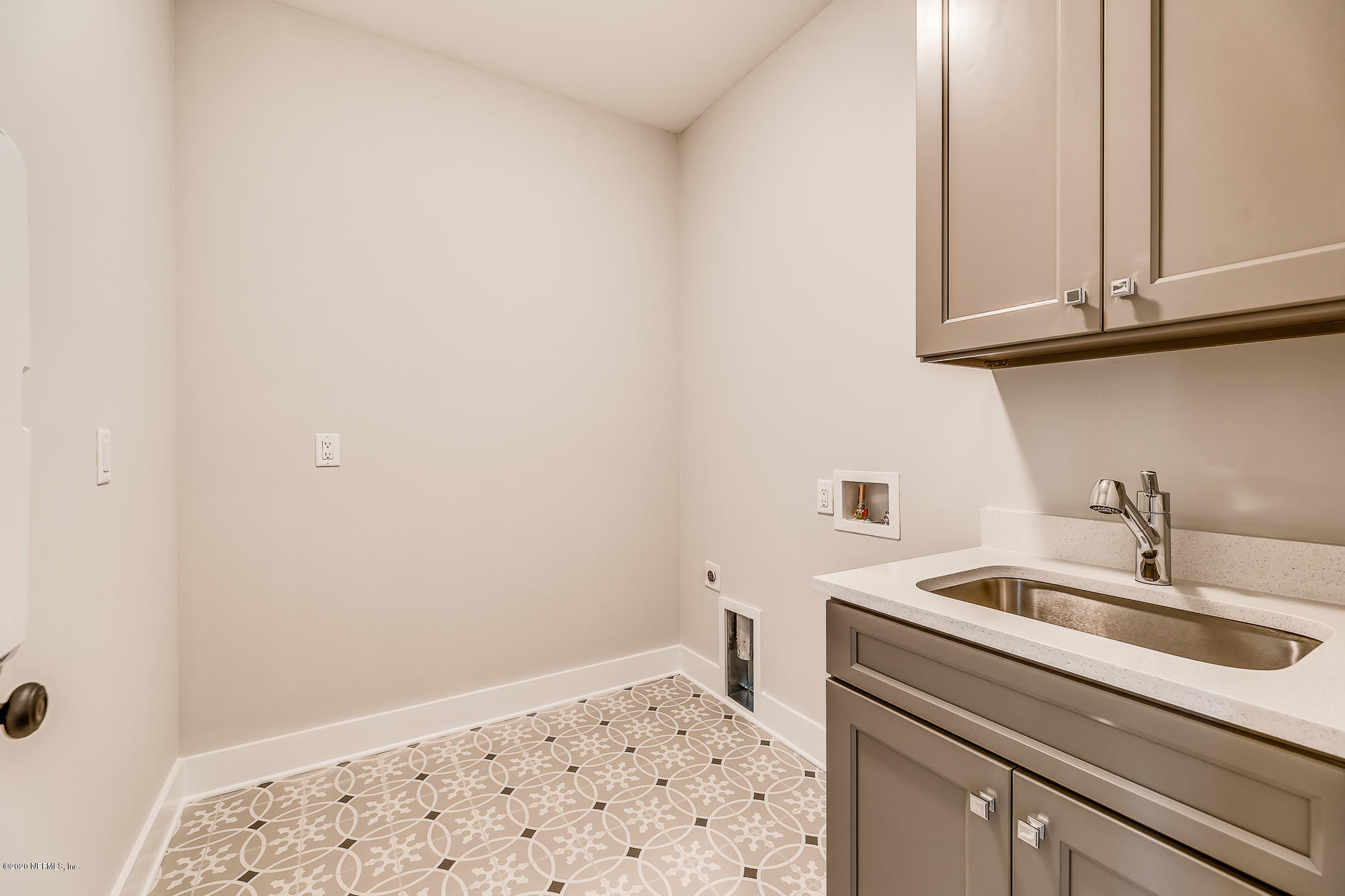 12507 Hidden Drive Jacksonville, FL 32225 - Photo 43 of 66 a bathroom with a sink and a mirror