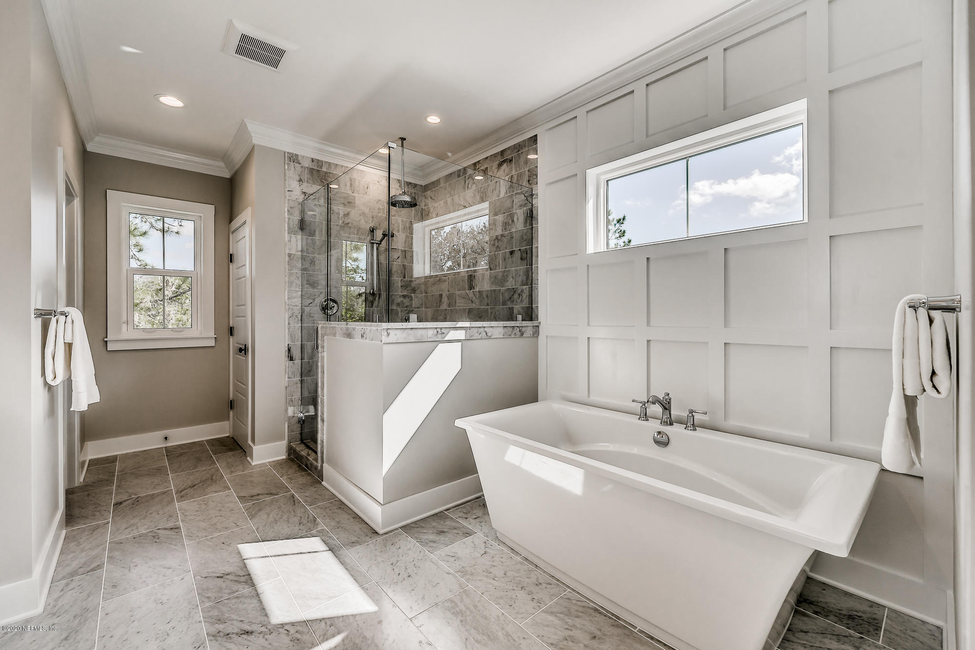 12507 Hidden Drive Jacksonville, FL 32225 - Photo 49 of 66 a bathroom with a bathtub a sink and a shower