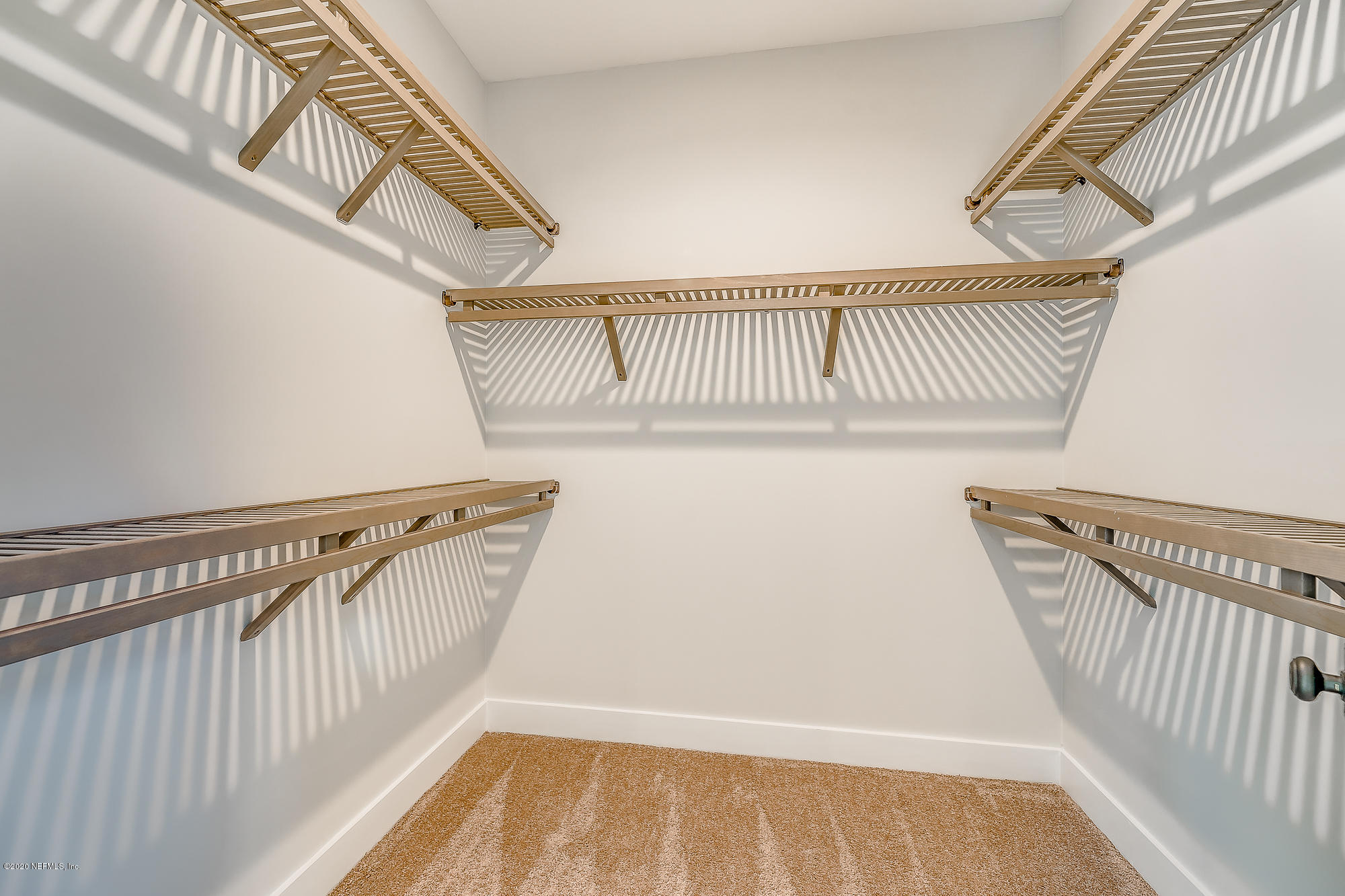 12507 Hidden Drive Jacksonville, FL 32225 - Photo 51 of 66 a view of staircase with railing and white walls