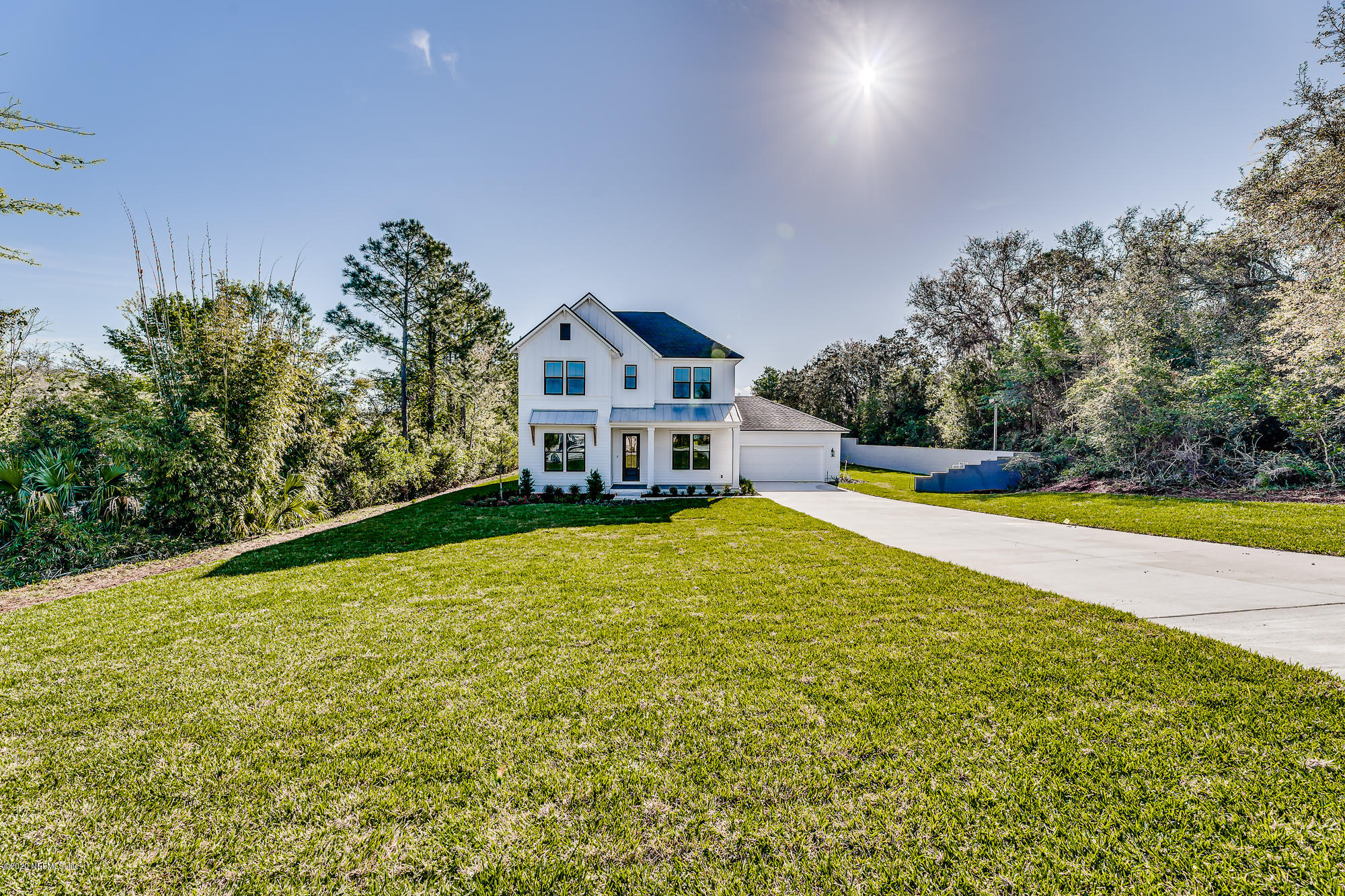 12507 Hidden Drive Jacksonville, FL 32225 - Photo 53 of 66 a view of a house with swimming pool