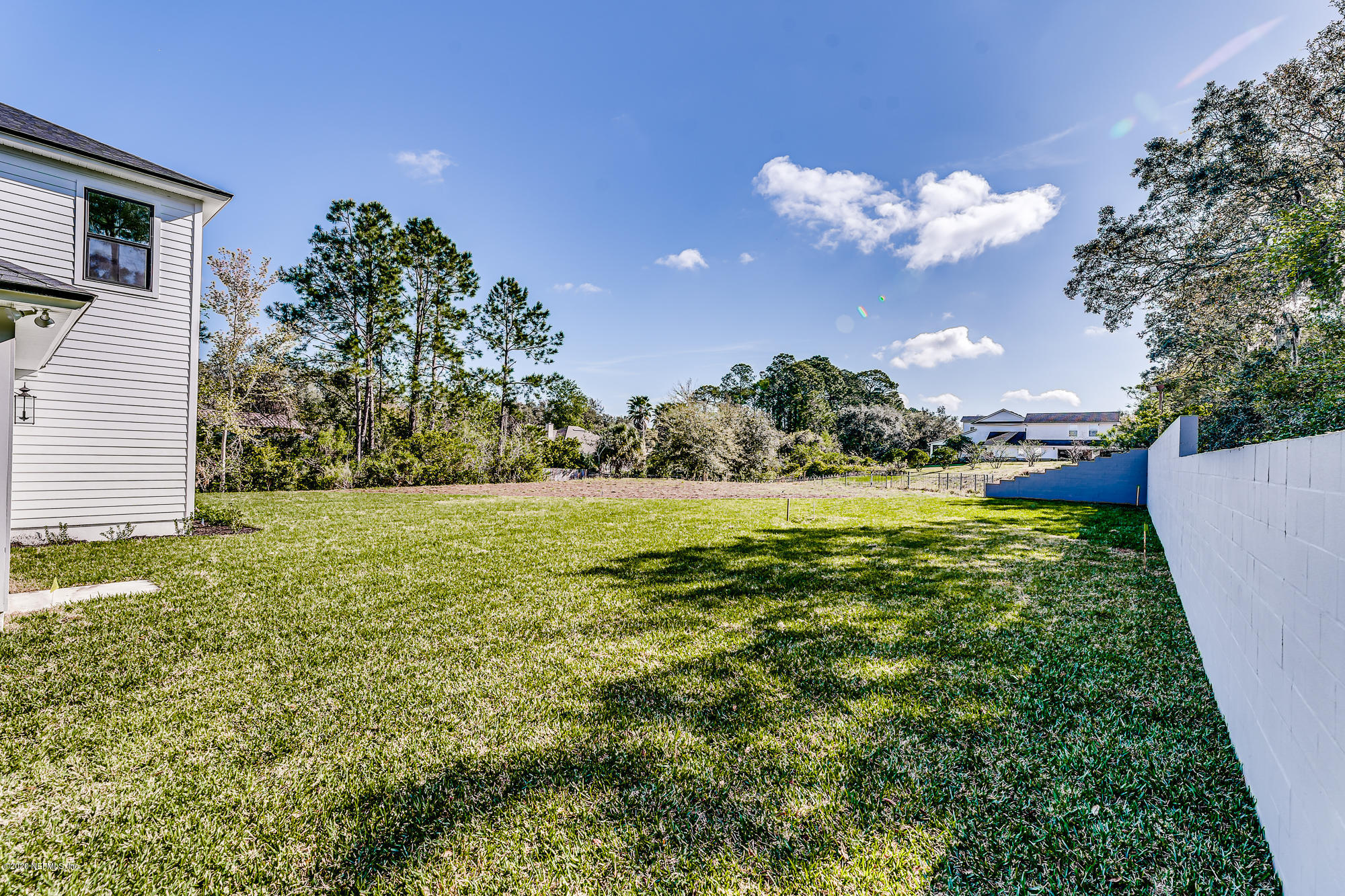 12507 Hidden Drive Jacksonville, FL 32225 - Photo 56 of 66 a view of a house with a big yard