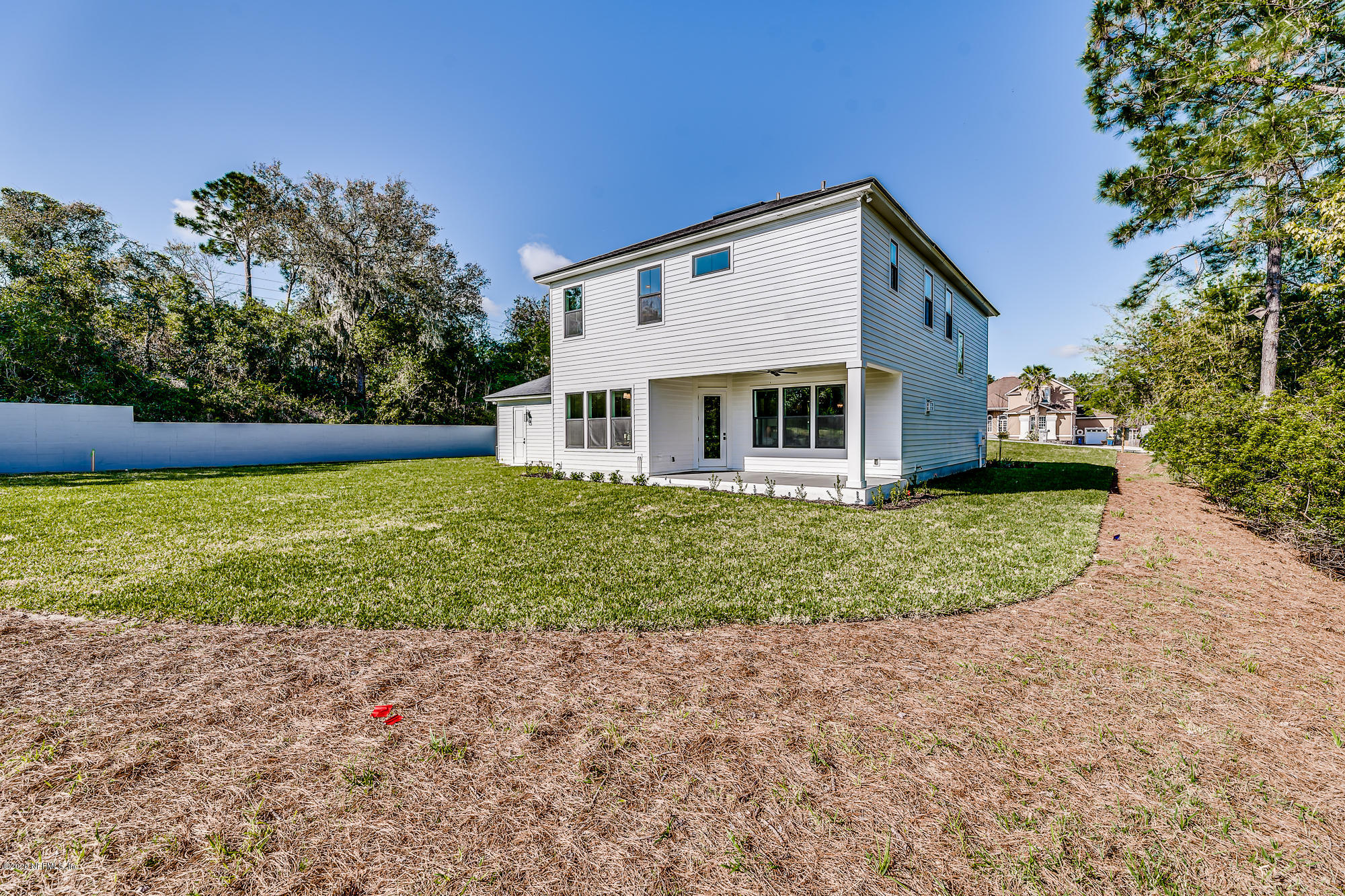 12507 Hidden Drive Jacksonville, FL 32225 - Photo 61 of 66 a front view of a house with garden