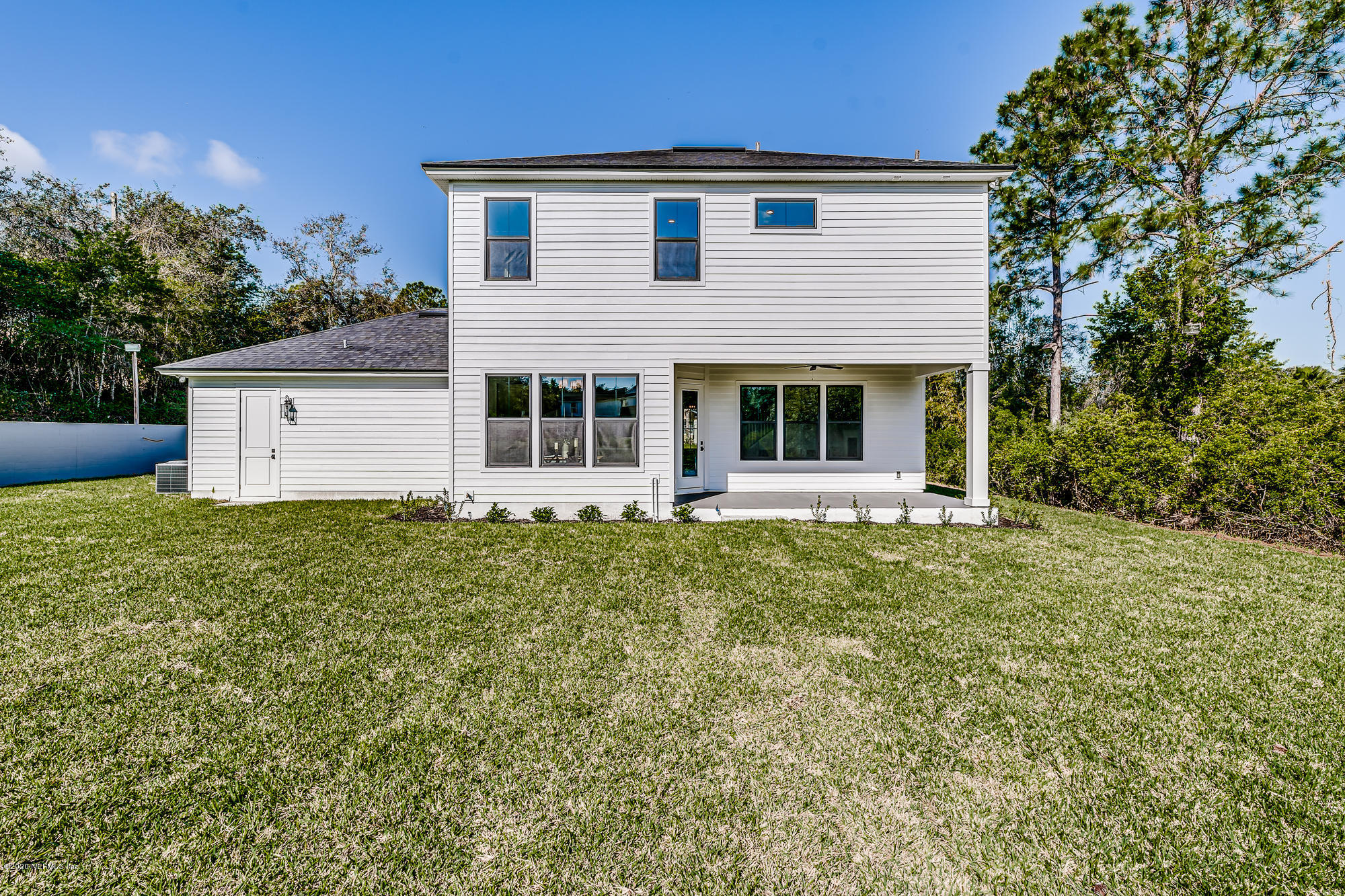 12507 Hidden Drive Jacksonville, FL 32225 - Photo 62 of 66 front view of a house with a small yard