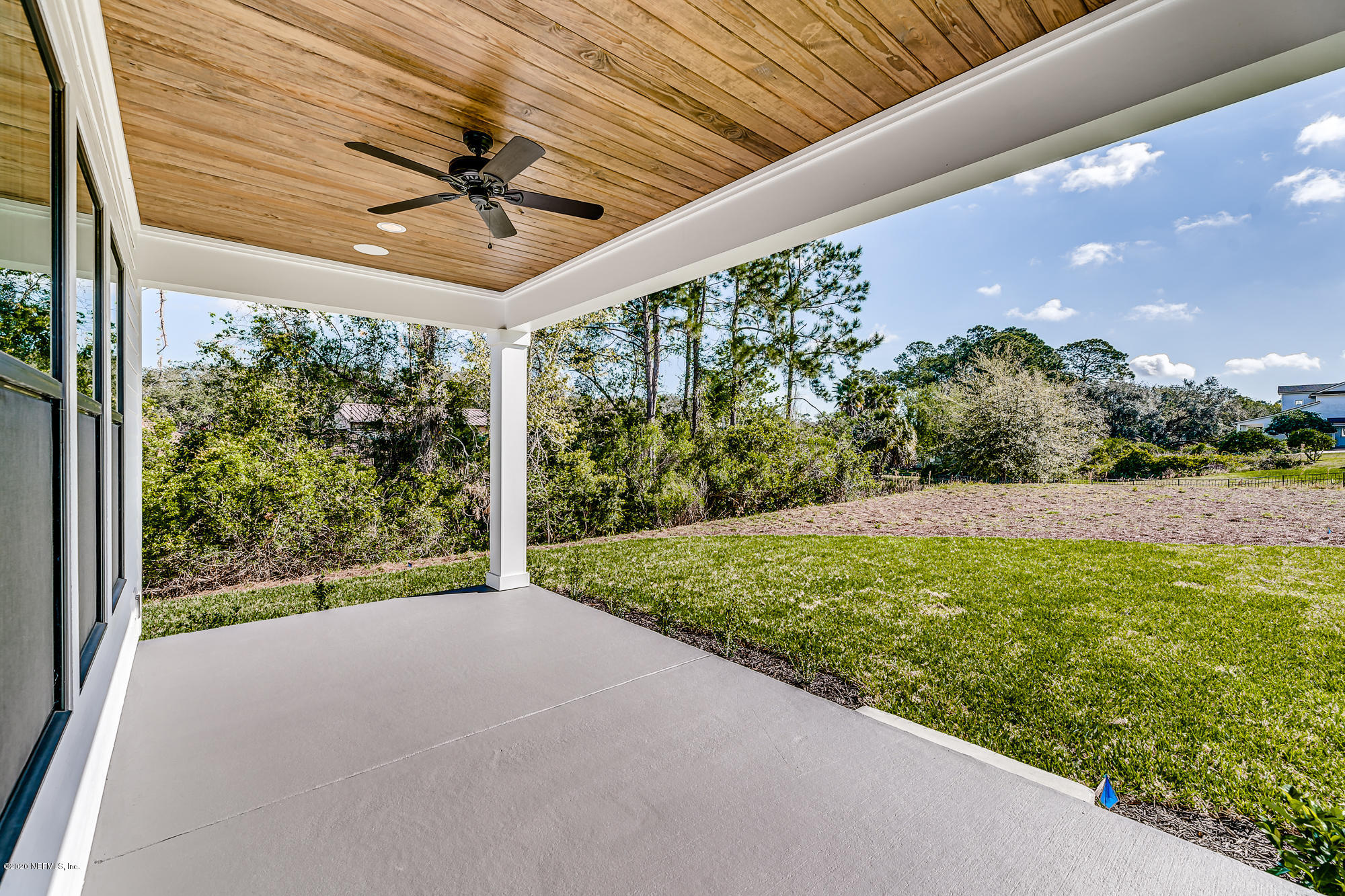 12507 Hidden Drive Jacksonville, FL 32225 - Photo 65 of 66 a view of a backyard of the house