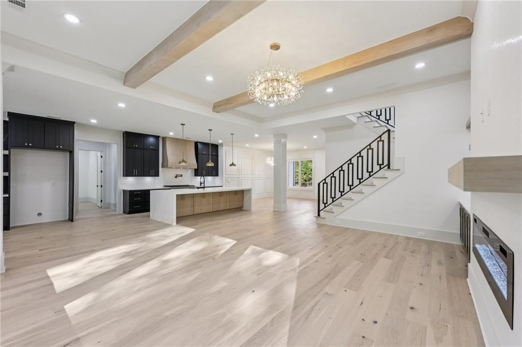 3209 Bold Springs Road Dacula, GA 30019 - Photo 12 of 62 a view of kitchen with cabinets and flat screen tv
