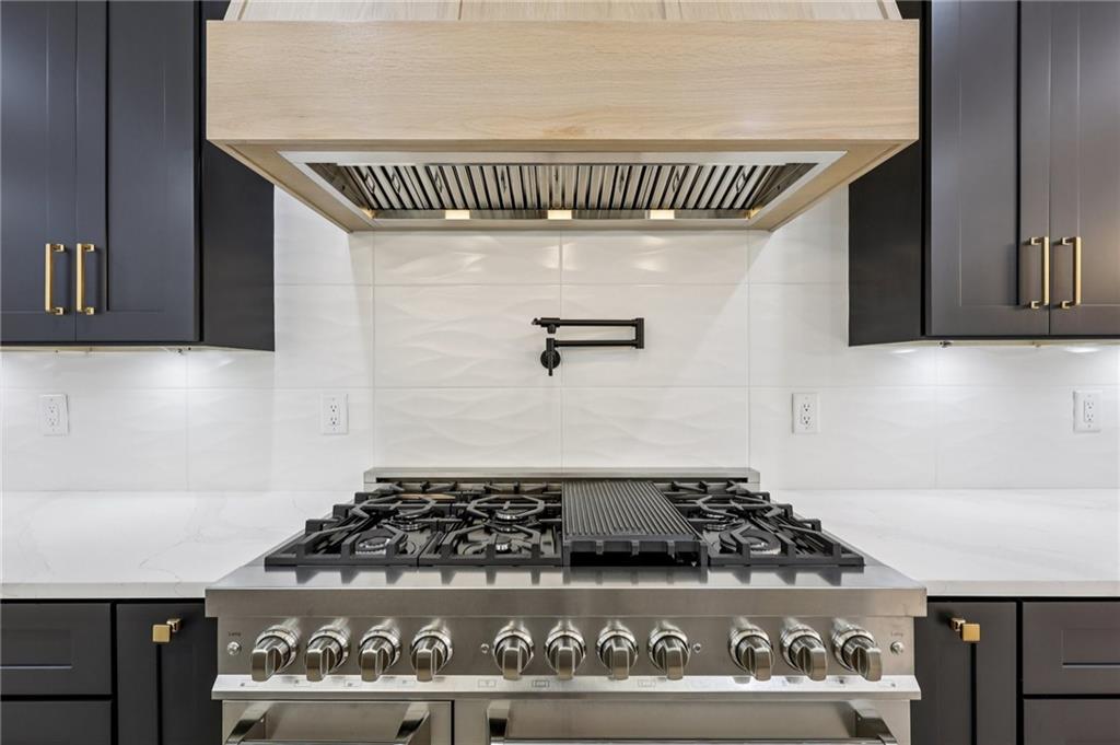 3209 Bold Springs Road Dacula, GA 30019 - Photo 17 of 62 a kitchen with a stove