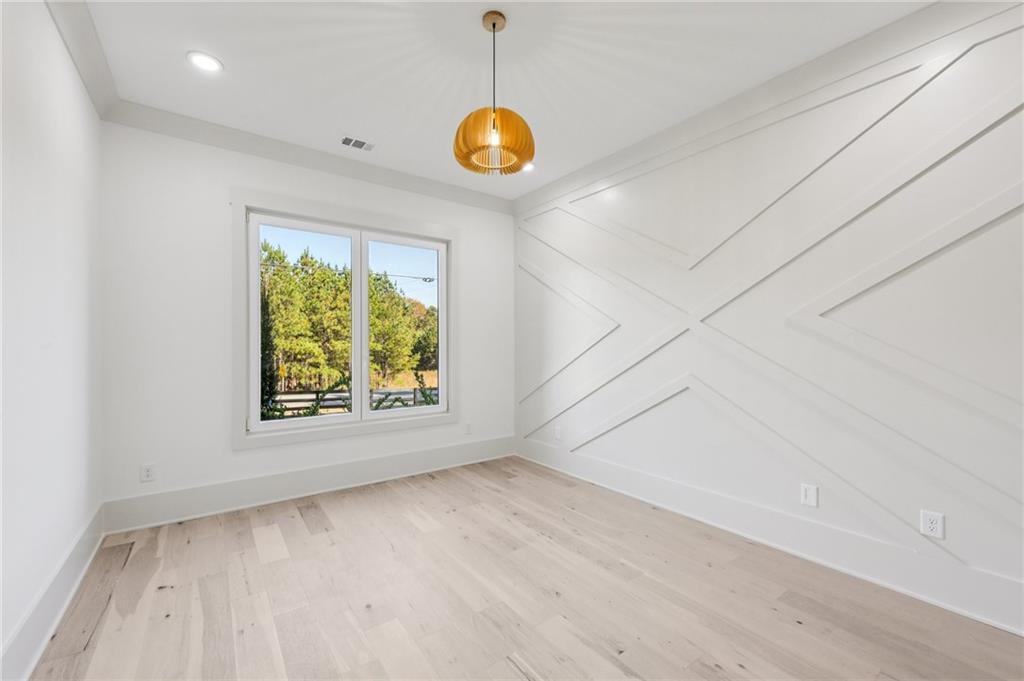 3209 Bold Springs Road Dacula, GA 30019 - Photo 21 of 62 an empty room with windows and entrance