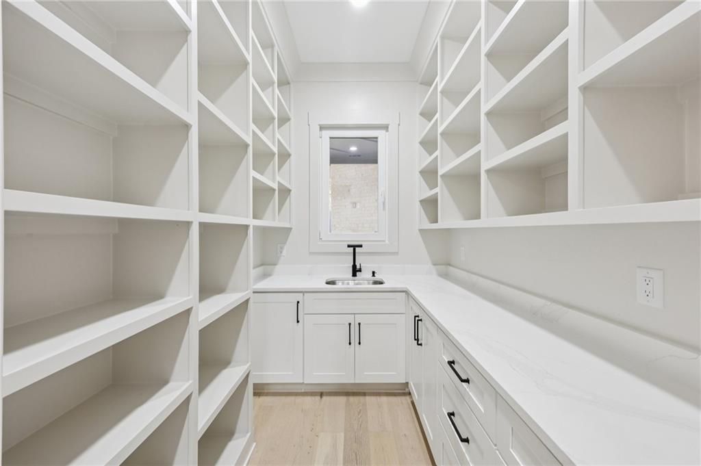 3209 Bold Springs Road Dacula, GA 30019 - Photo 25 of 62 a kitchen with a sink and a cabinets