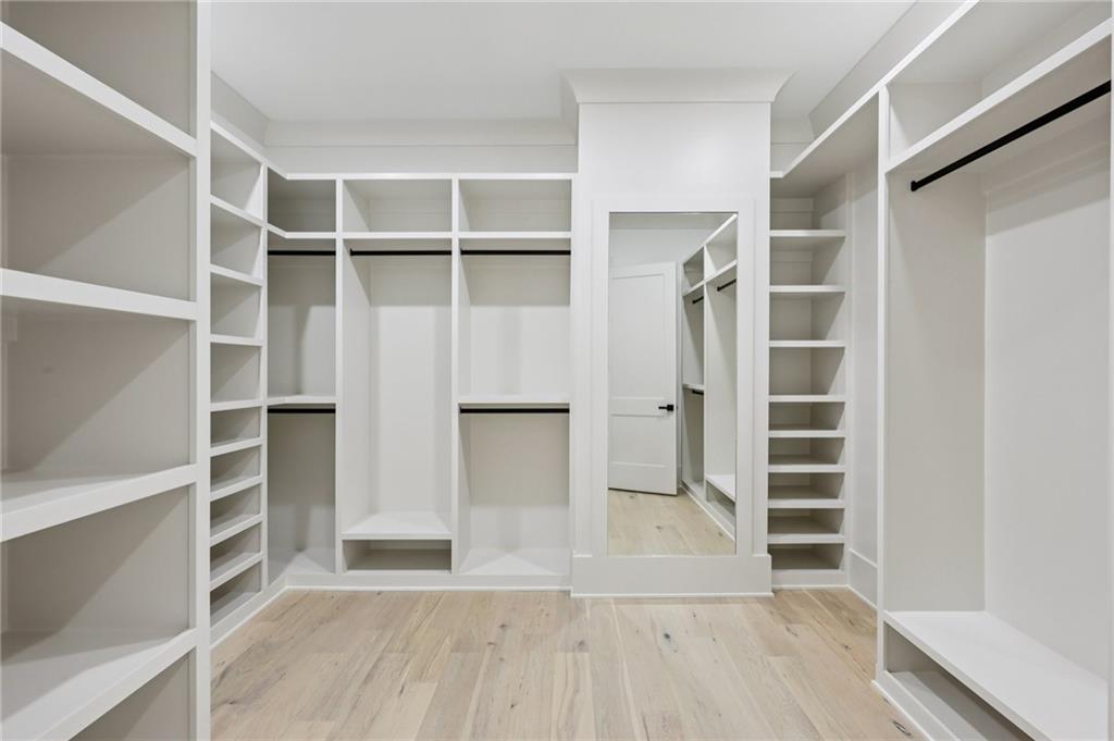 3209 Bold Springs Road Dacula, GA 30019 - Photo 28 of 62 a view of walk in closet with empty racks
