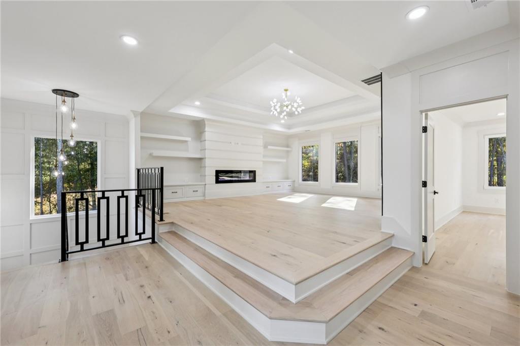 3209 Bold Springs Road Dacula, GA 30019 - Photo 31 of 62 a view of livingroom with hardwood floor and windows