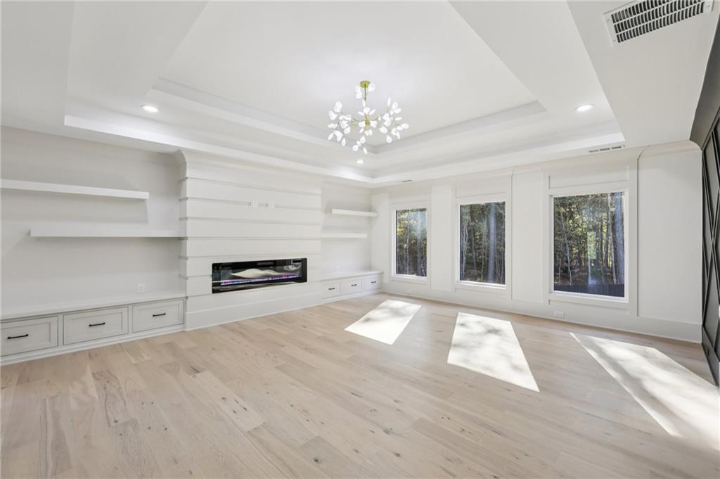 3209 Bold Springs Road Dacula, GA 30019 - Photo 32 of 62 a view of an empty room with a window and fireplace