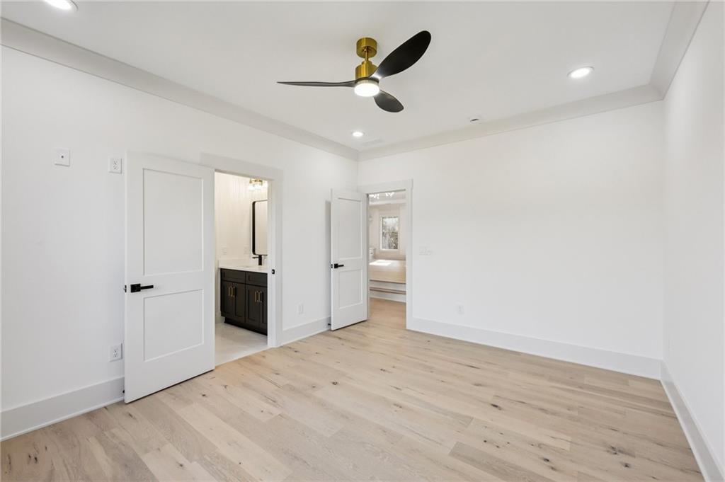 3209 Bold Springs Road Dacula, GA 30019 - Photo 38 of 62 wooden floor in an empty room with a window