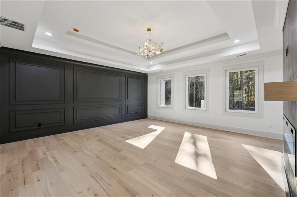 3209 Bold Springs Road Dacula, GA 30019 - Photo 47 of 62 a view of an empty room with wooden floor and a window