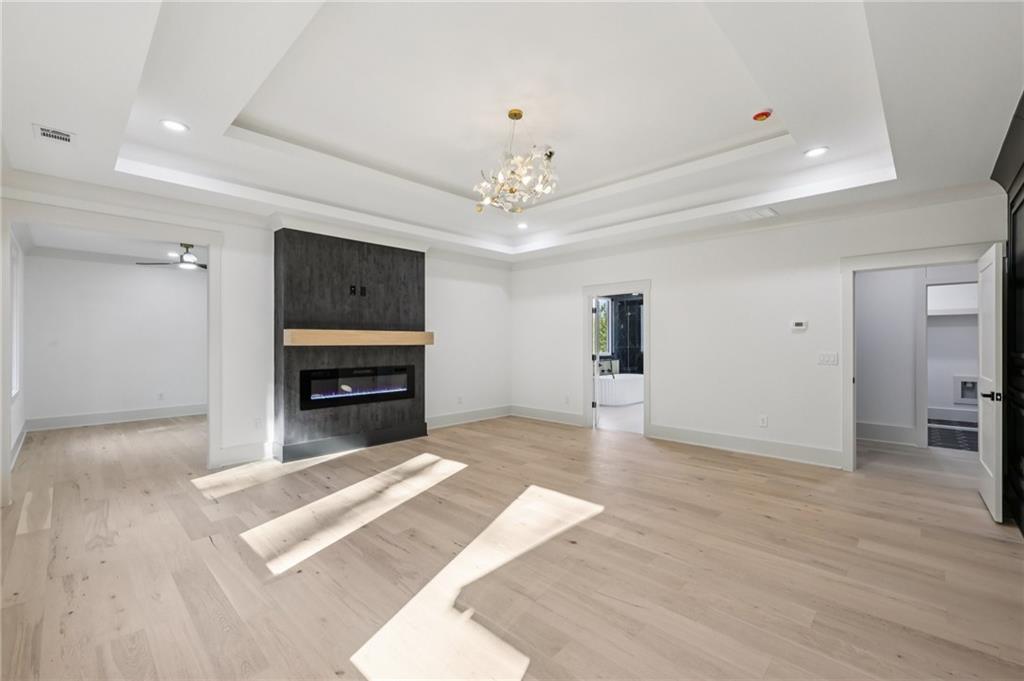 3209 Bold Springs Road Dacula, GA 30019 - Photo 48 of 62 a living room with furniture and a fireplace