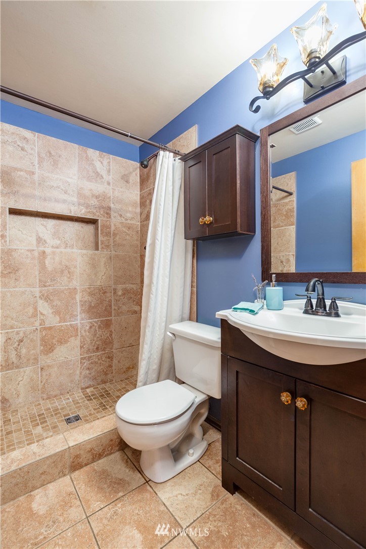 22415 73rd Place West Edmonds, WA 98026 - Photo 17 of 25 a bathroom with a sink toilet and shower