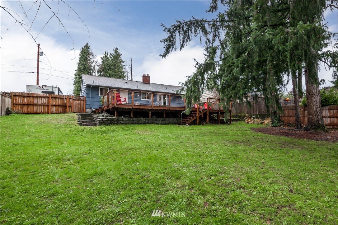22415 73rd Place West Edmonds, WA 98026 - Photo 24 of 25 a view of a house with a big yard and large trees