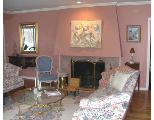204 Chestnut Street Andover, MA 01810 - Photo 13 of 25 a living room with furniture and a fireplace