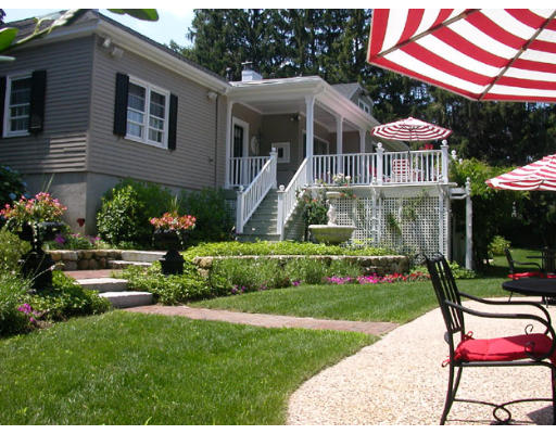204 Chestnut Street Andover, MA 01810 - Photo 16 of 25 a front view of a house with garden