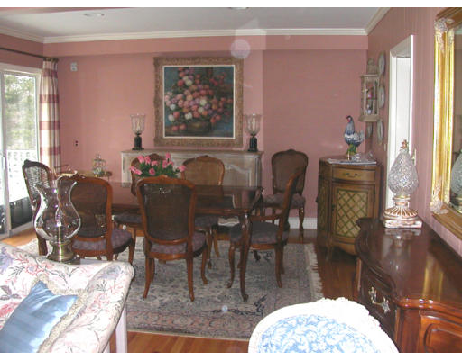 204 Chestnut Street Andover, MA 01810 - Photo 2 of 25 a dining room with furniture and wooden floor