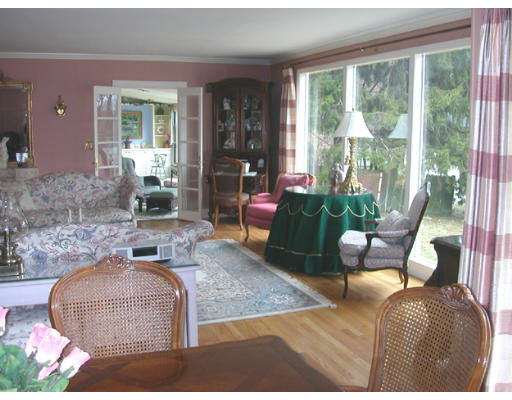 204 Chestnut Street Andover, MA 01810 - Photo 5 of 25 a living room with furniture and a large window