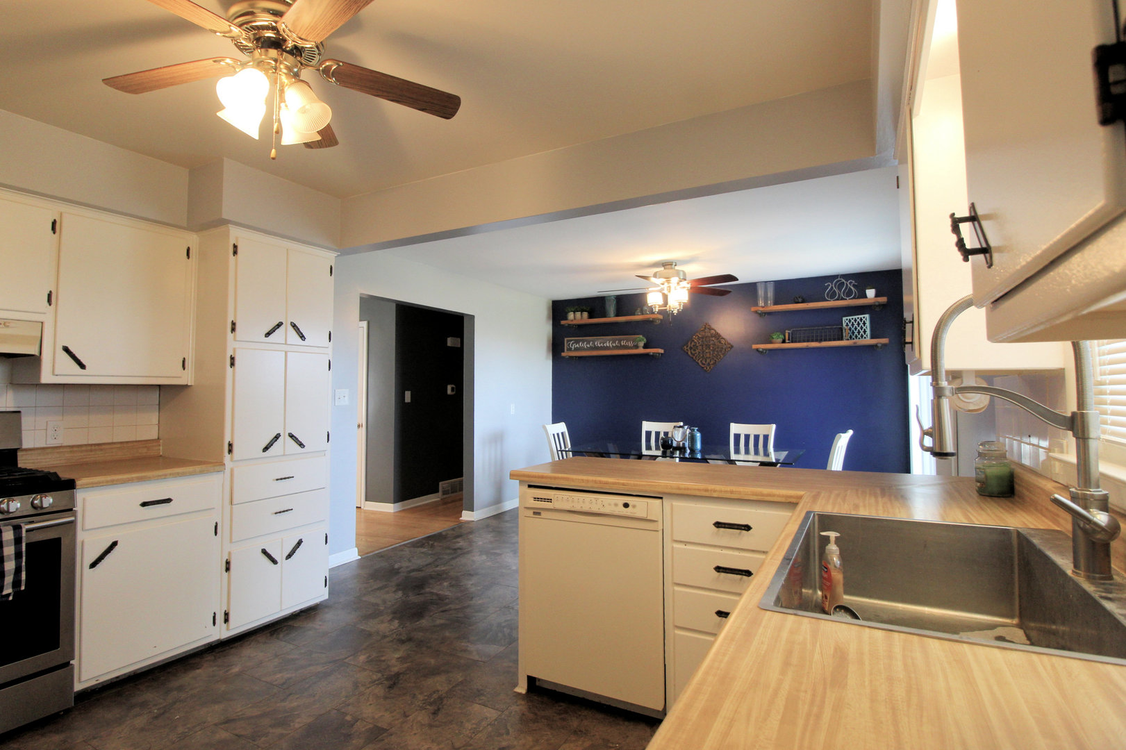 2838 River Road Kankakee, IL 60901 - Photo 12 of 24 a kitchen with a cabinets and chandelier