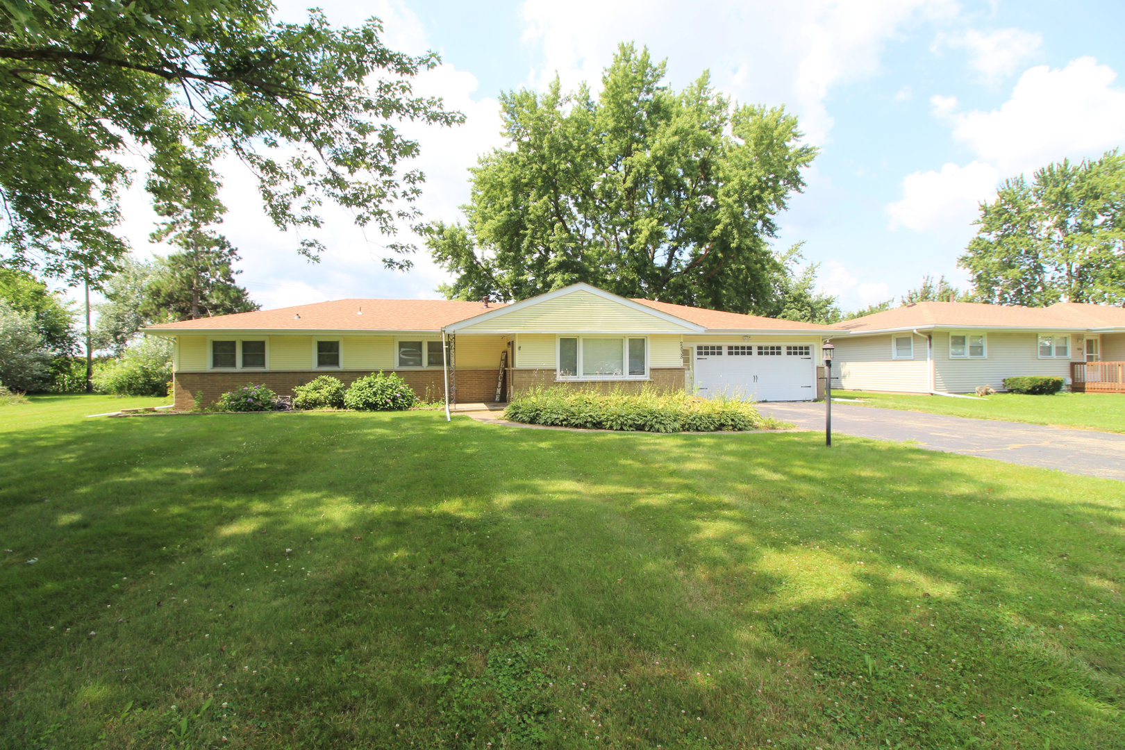 2838 River Road Kankakee, IL 60901 - Photo 24 of 24 a front view of a house with a yard