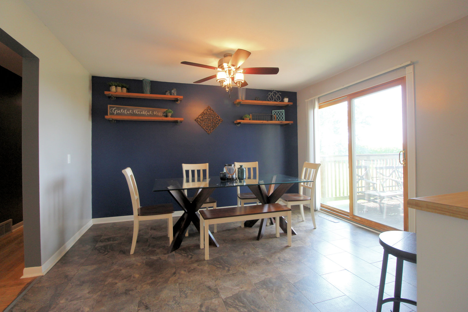 2838 River Road Kankakee, IL 60901 - Photo 6 of 24 a dining room with furniture a chandelier and wooden floor