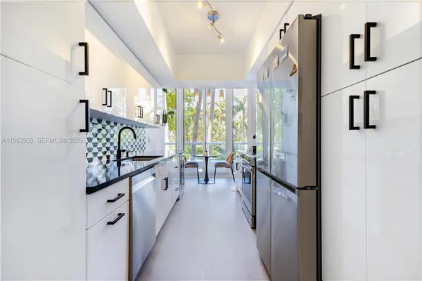 a view of a hallway with windows