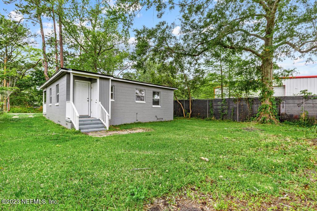 1023 Seba Street Jacksonville, FL 32205 - Photo 25 of 27 a view of a back yard with an outdoor space