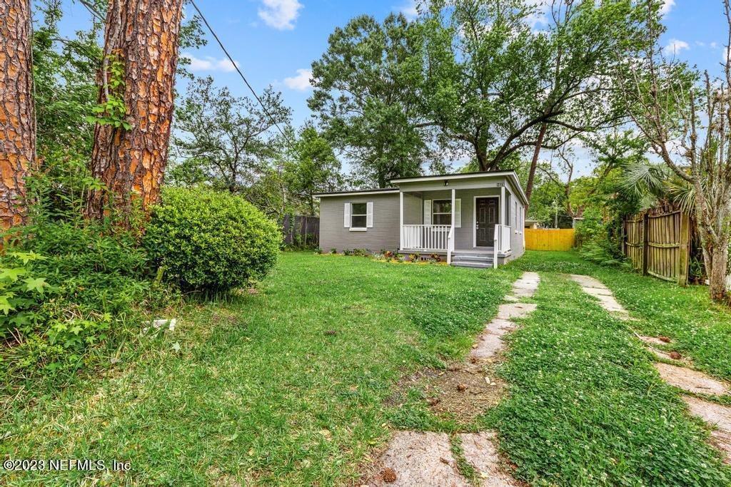 1023 Seba Street Jacksonville, FL 32205 - Photo 3 of 27 a view of a house with a yard and potted plants