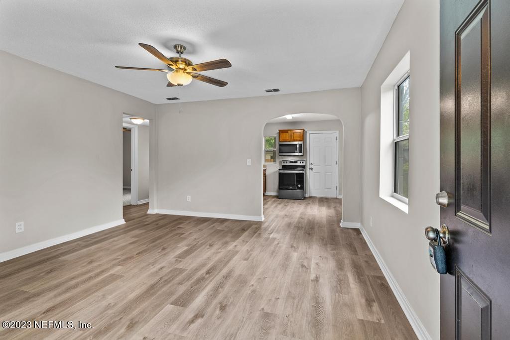 1023 Seba Street Jacksonville, FL 32205 - Photo 8 of 27 a view of empty room with wooden floor