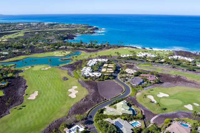a view of a city with an ocean