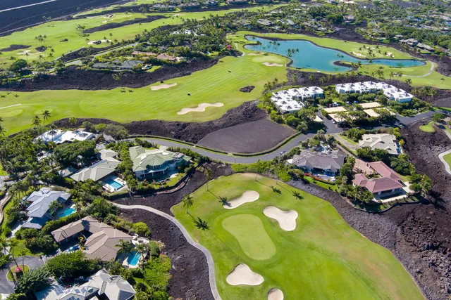 an aerial view of a pool patio swimming pool and outdoor seating