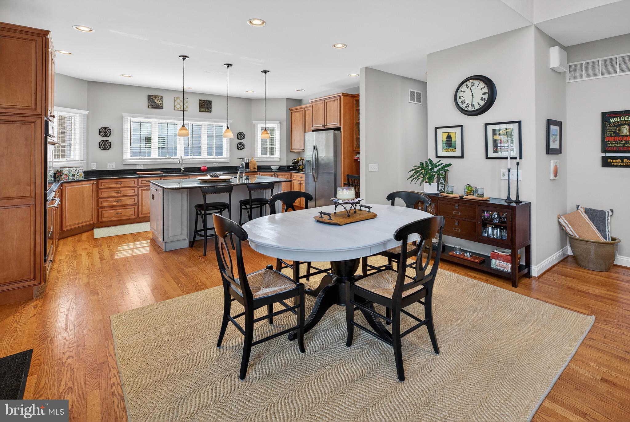 135 Cornwall Road Rehoboth Beach, DE 19971 - Photo 25 of 101 a view of a dining room with furniture and wooden floor