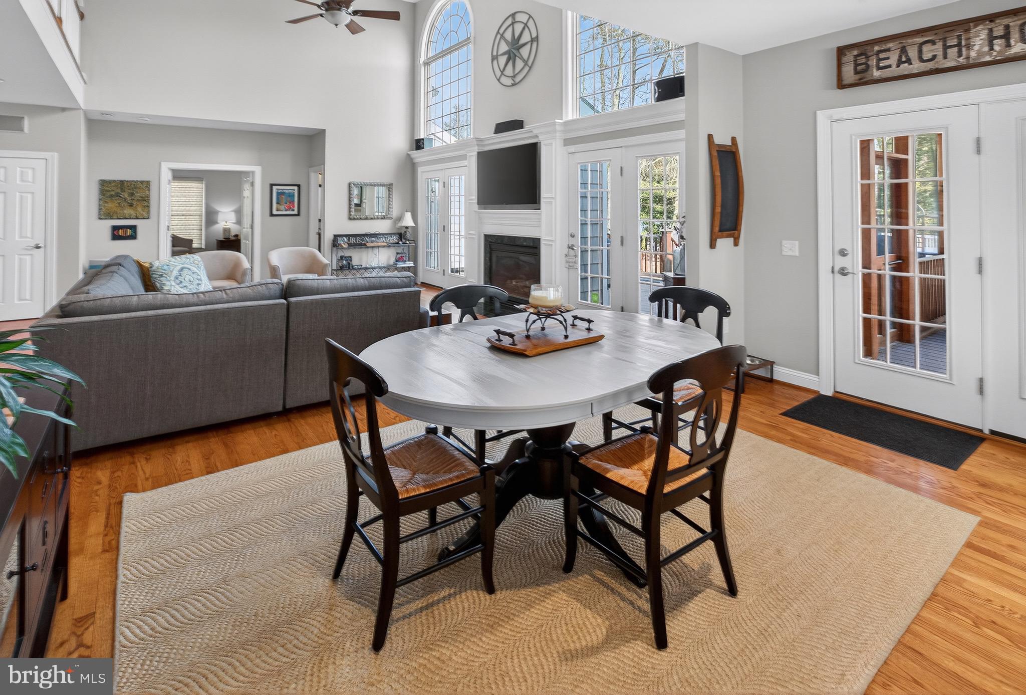 135 Cornwall Road Rehoboth Beach, DE 19971 - Photo 26 of 101 a view of a dining room with furniture and a large window