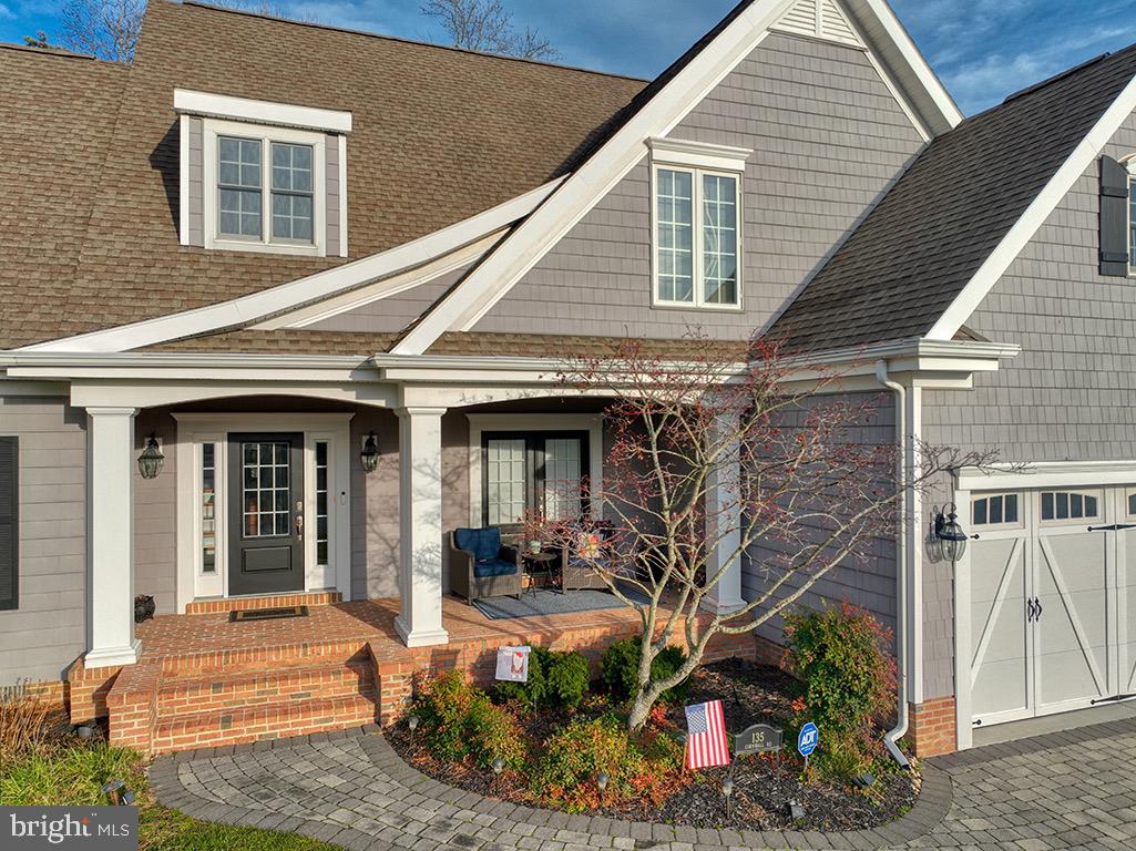 135 Cornwall Road Rehoboth Beach, DE 19971 - Photo 3 of 101 a front view of a house with garden