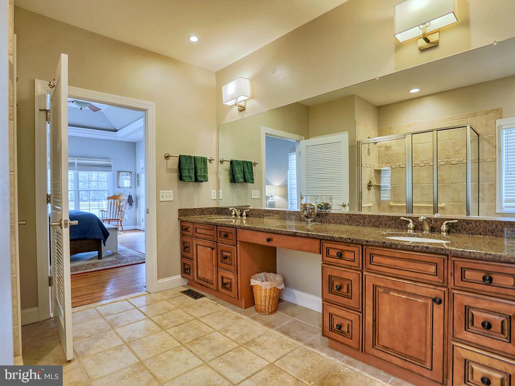 135 Cornwall Road Rehoboth Beach, DE 19971 - Photo 38 of 101 First level ensuite offers luxury & functionality.