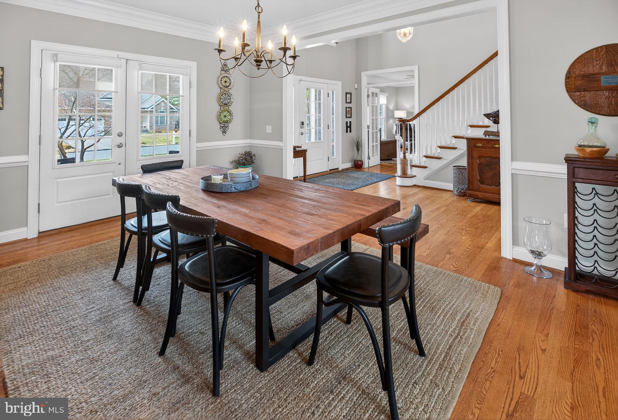 135 Cornwall Road Rehoboth Beach, DE 19971 - Photo 41 of 101 a view of a dining room with furniture and wooden floor