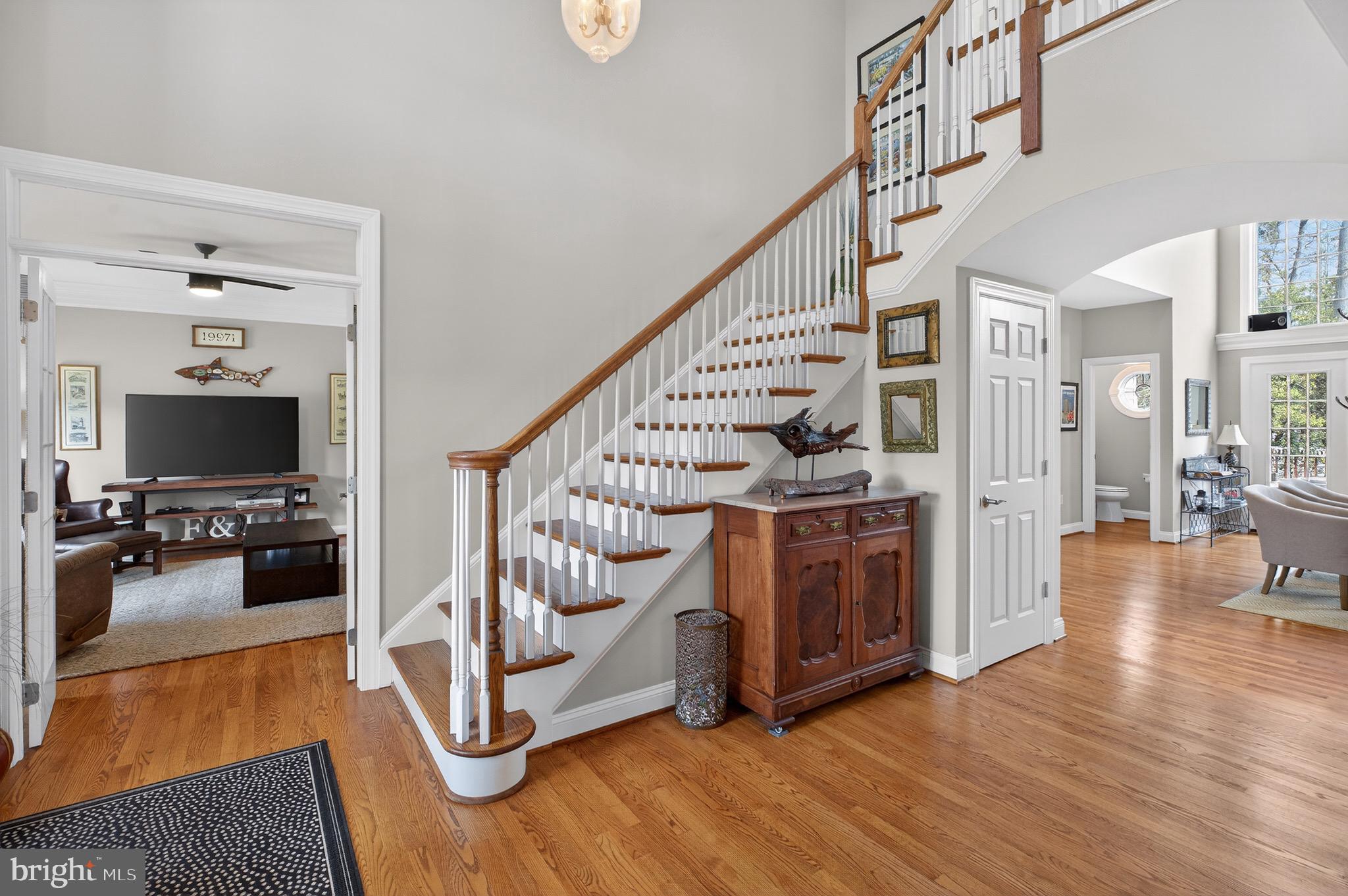 135 Cornwall Road Rehoboth Beach, DE 19971 - Photo 48 of 101 a view of entryway livingroom and hall with wooden floor