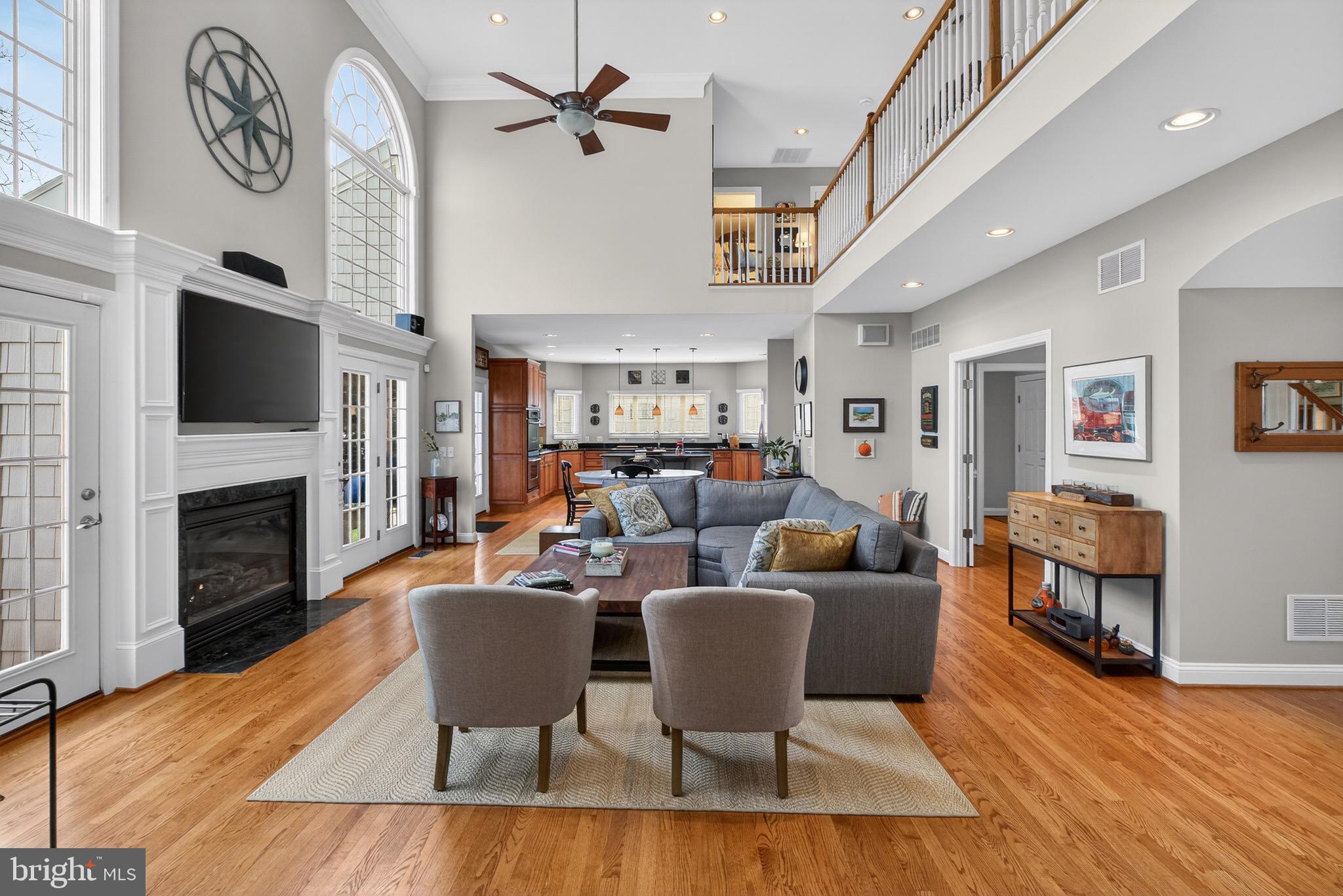 135 Cornwall Road Rehoboth Beach, DE 19971 - Photo 6 of 101 a living room with fireplace furniture and a flat screen tv