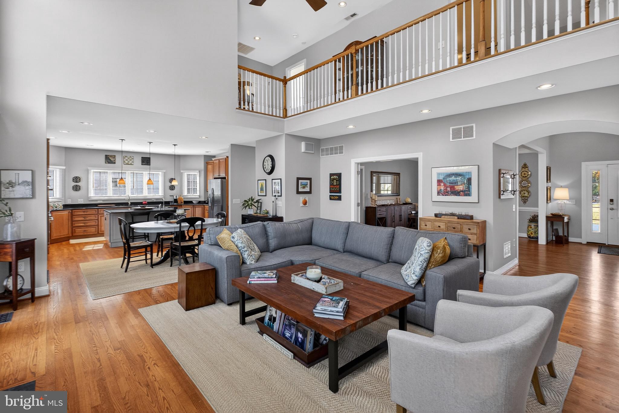 135 Cornwall Road Rehoboth Beach, DE 19971 - Photo 7 of 101 a living room with furniture kitchen view and a wooden floor
