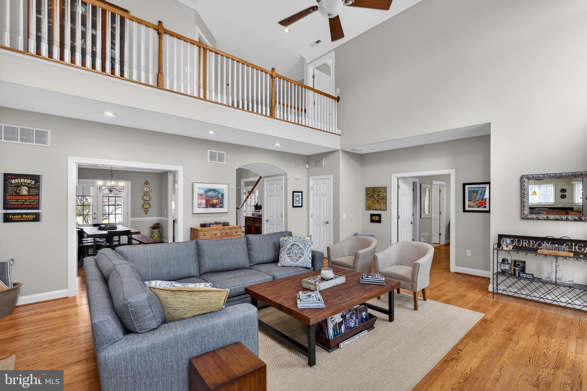 135 Cornwall Road Rehoboth Beach, DE 19971 - Photo 9 of 101 a living room with furniture a couch and wooden floor