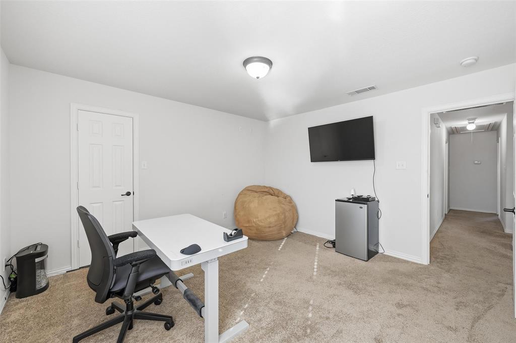 2319 Goshawk Street Grand Prairie, TX 75052 - Photo 26 of 40 a view of a workspace with furniture