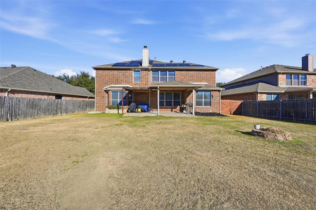 2319 Goshawk Street Grand Prairie, TX 75052 - Photo 38 of 40 front view of a house with a large window